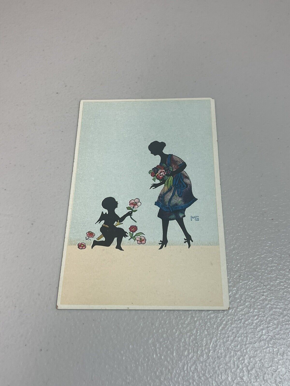 Artist Signed MG Marte Graf Lady With Cupid Silhouette  postcard 760