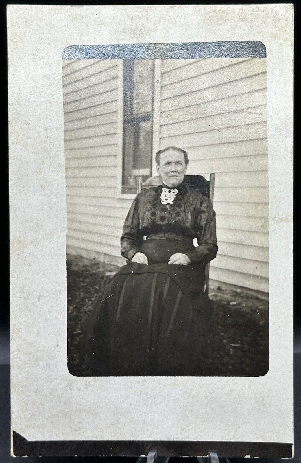 1904-1918 AZO RPPC Of Elderly Woman Wearing Dress & Sitting In Chair