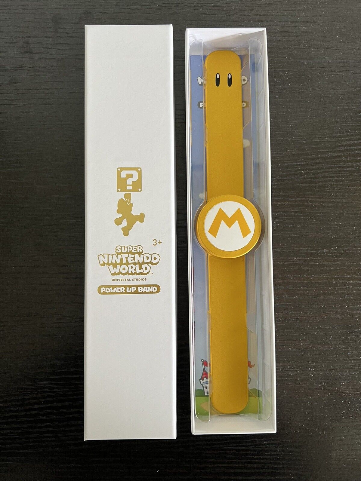 Universal Studios Super Nintendo World Mario Gold Power Up Band. Limited Release