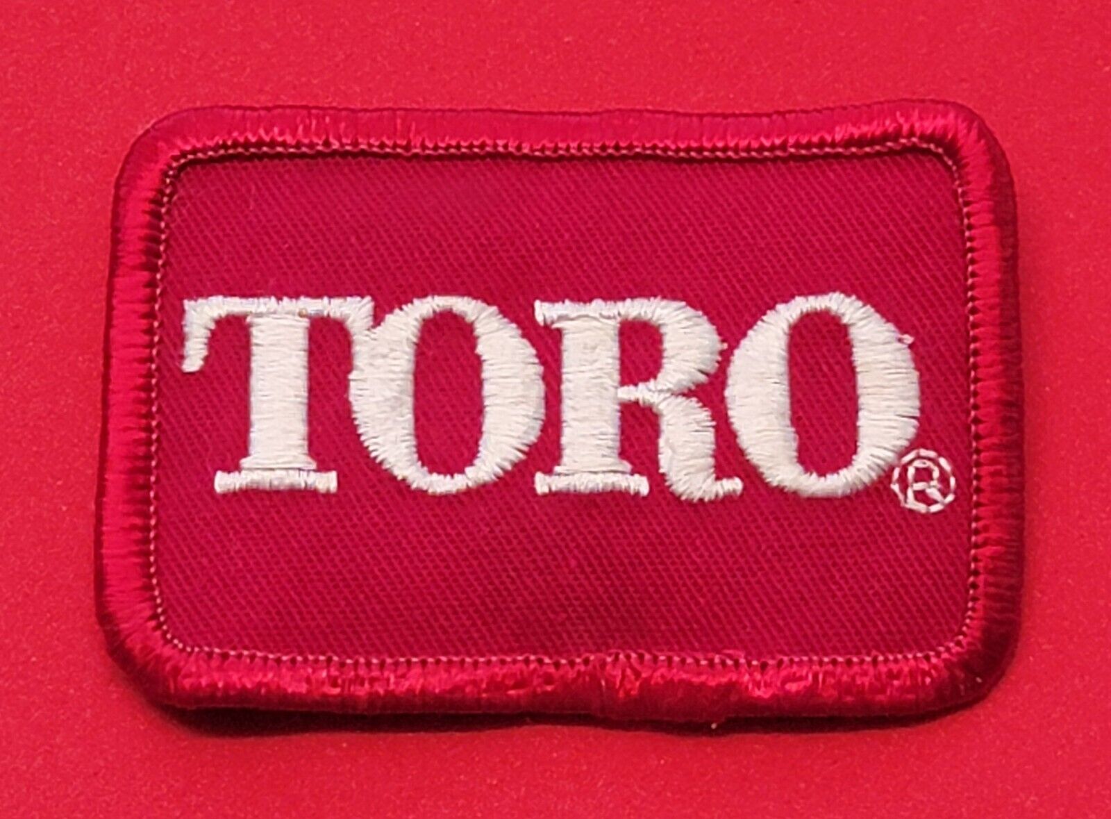 TORO LAWN EQUIPMENT BADGE PATCH VINTAGE AUTHENTIC TORO (NEW OLD STOCK)