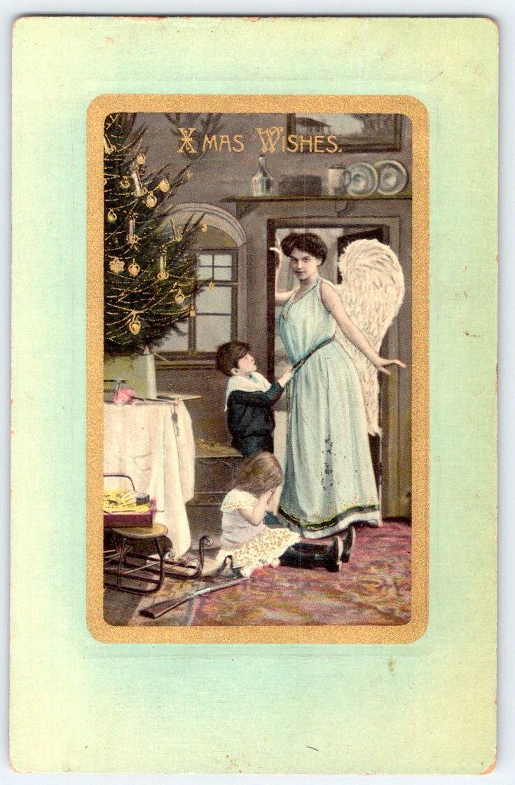 1911 CHRISTMAS CRYING GIRL GUN BOY SEXY ANGEL WHAT IS GOING ON HERE? POSTCARD