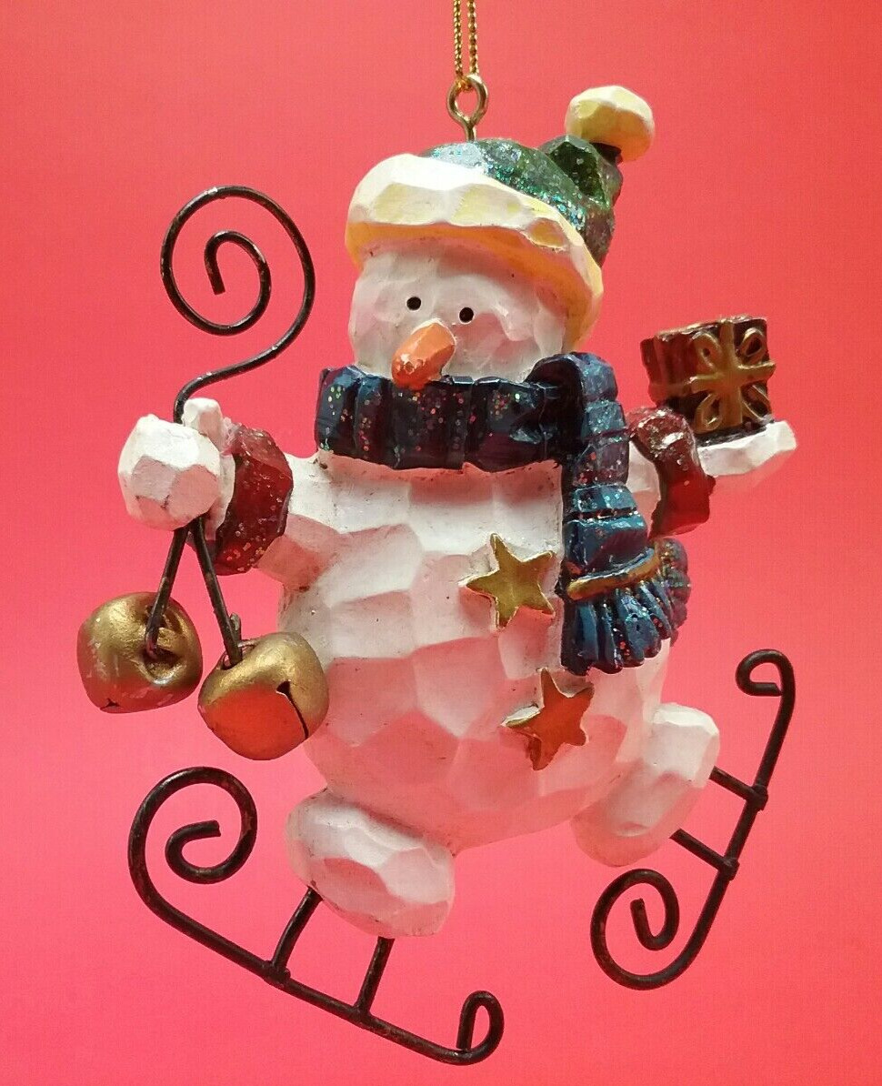 Costco Whimsical Ice Skating Snowman w/Bells & Present Christmas Ornament 4x3 in