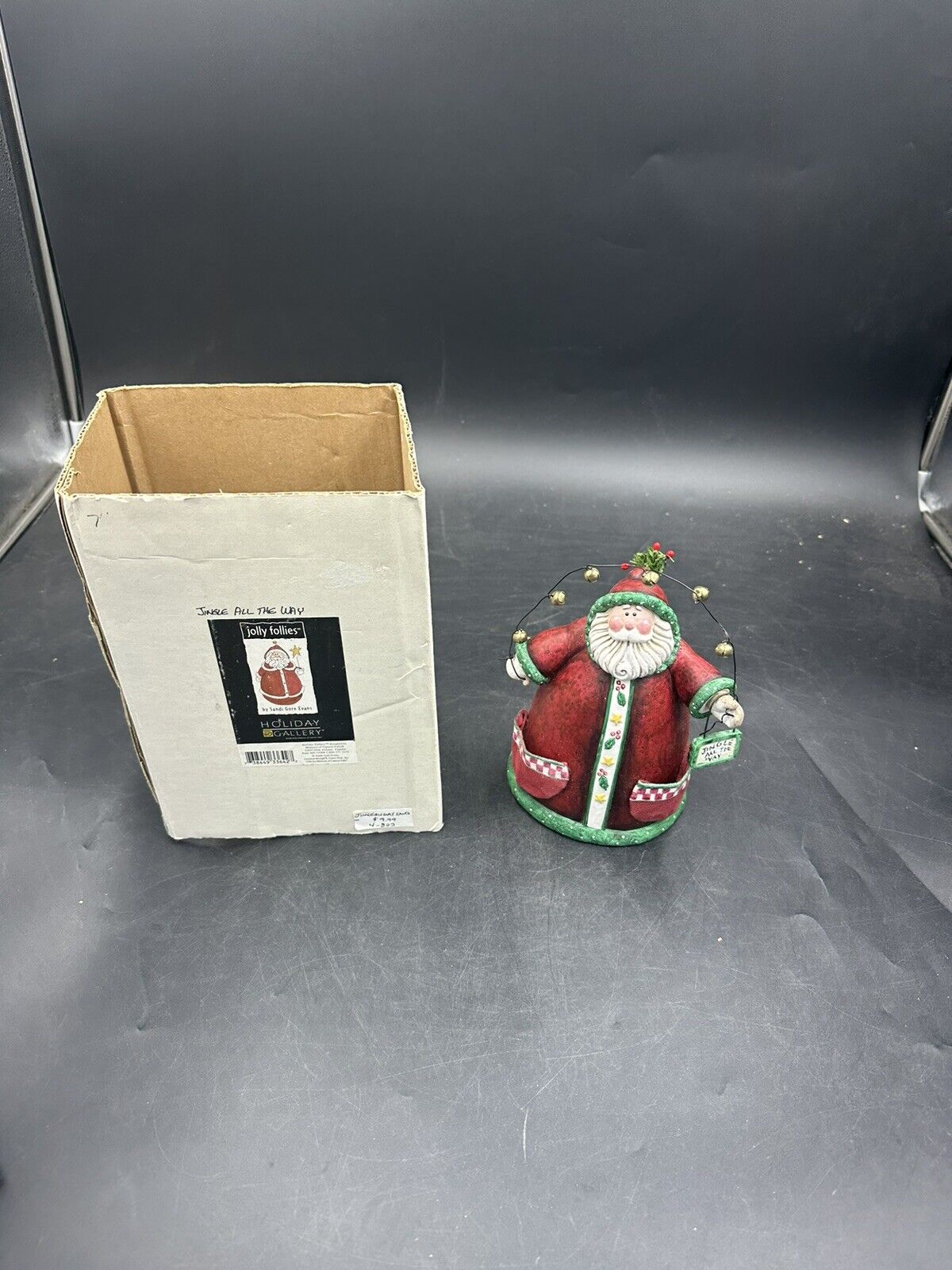 Sandi Gore Evans Jolly Follies Santa figurine “Jingle all the Way”