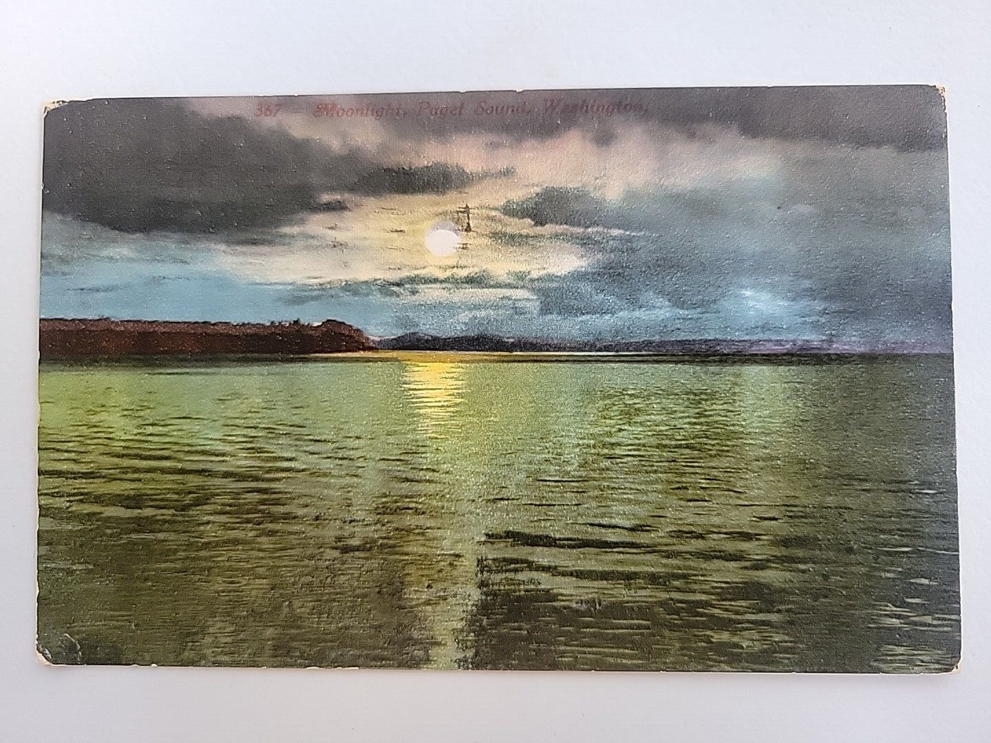 vintage postcard water scene at sunset washington state posted 1915 stamped