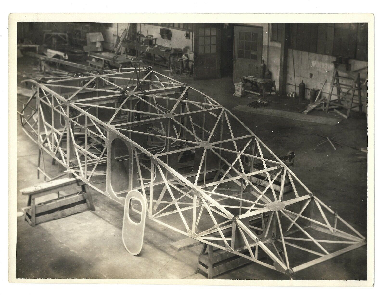 1940\'S SKELETON STRUCTURE OF AIRPLANE AEROFOIL FUSELAGE-BLACK AND WHITE-9X7-VF