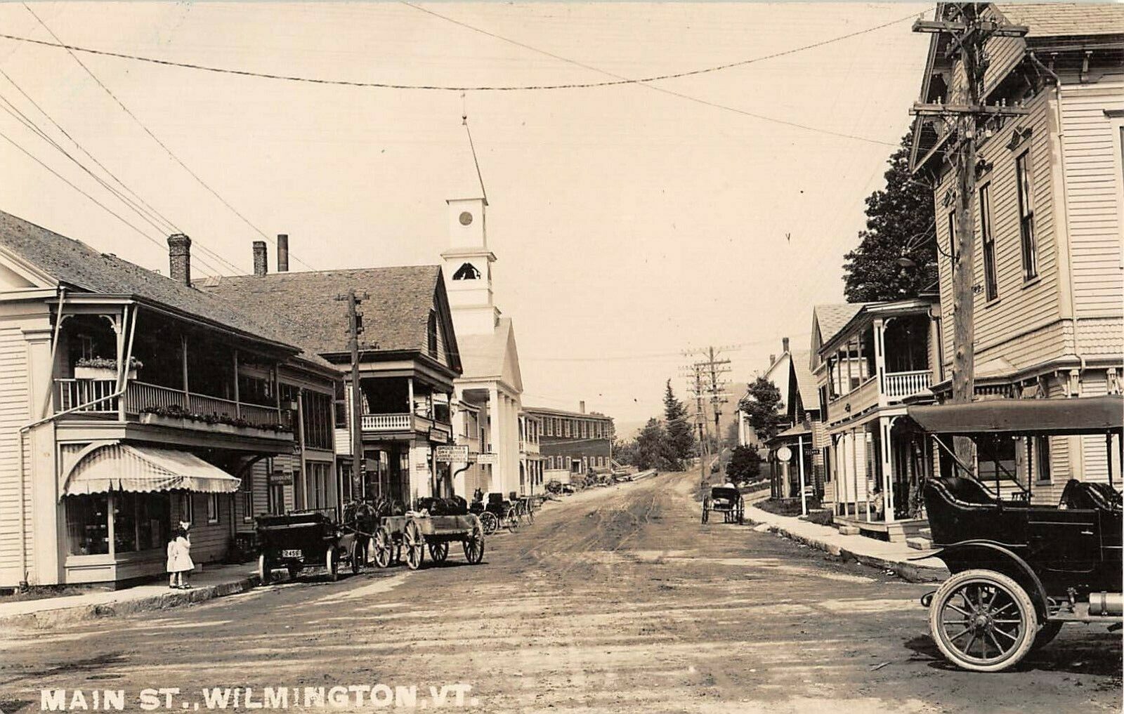 c.1915? RPPC Stores Church Early Car Gas Pump Main St. Wilmington VT
