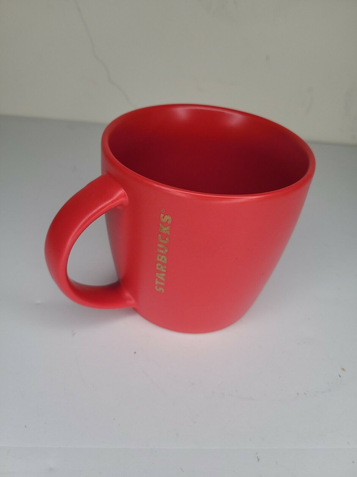 2016 Starbucks Matte Solid Red With Gold Lettering Coffee Mug 14oz.