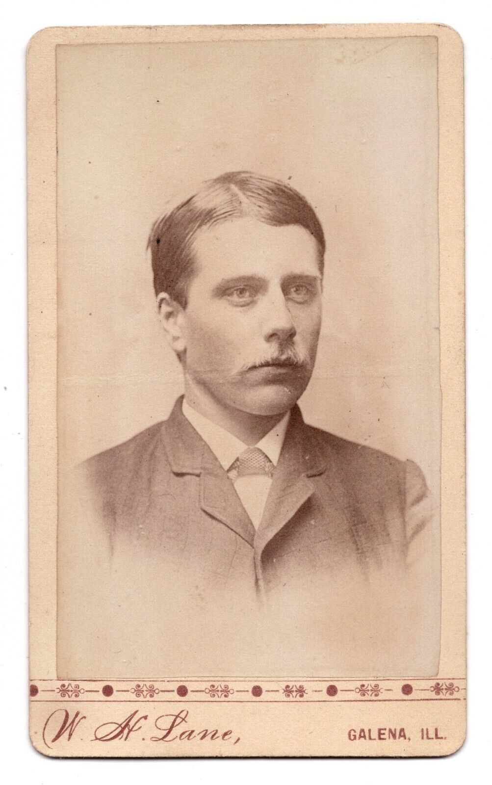 C. 1880s CDV W.H. LANE HANDSOME YOUNG MAN IN SUIT WITH MUSTACHE GALENA ILLINOIS