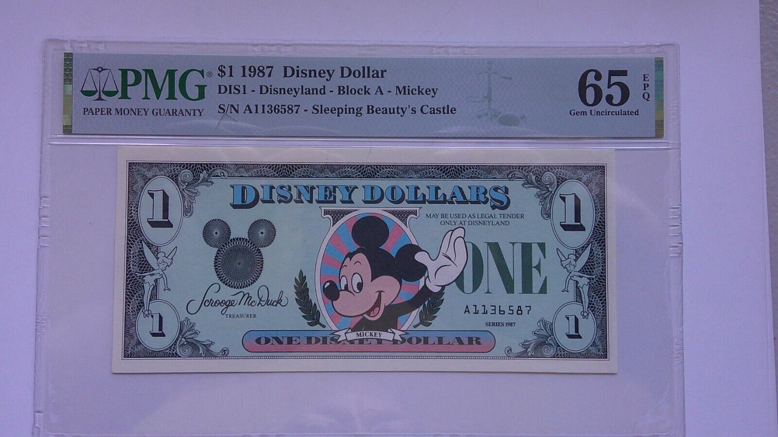 Walt Disney $1 1987 Disney Dollar Gem Unc PMG 65 EPQ