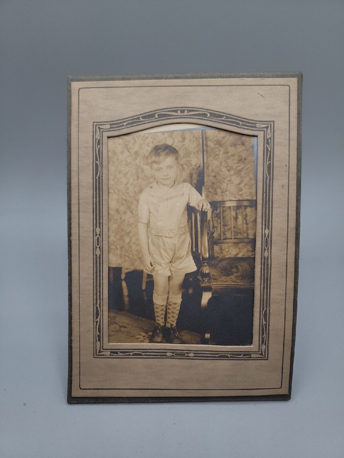 Antique Photograph Little Boy Shorts Socks Pulled Up Posing Leaning On Chair