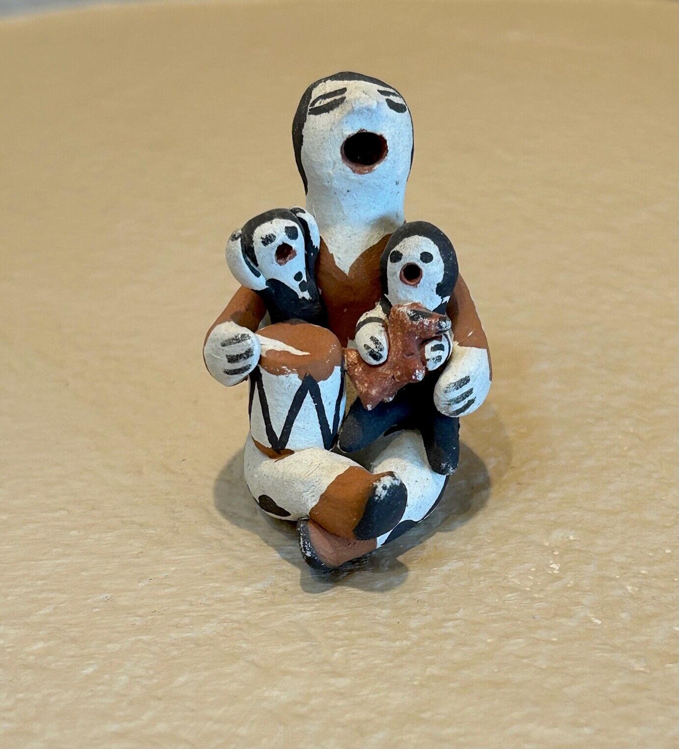 Vintage Miniature Acoma Storyteller Holding a Drum and Two Children