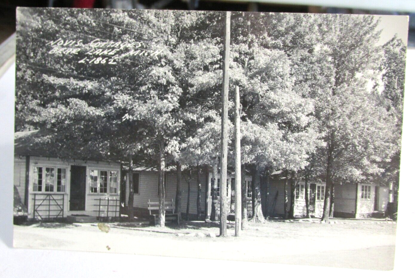 1951 BEAR LAKE MICHIGAN Mi. RPPC Real Photo Postcard Novis Cottages #L-1862