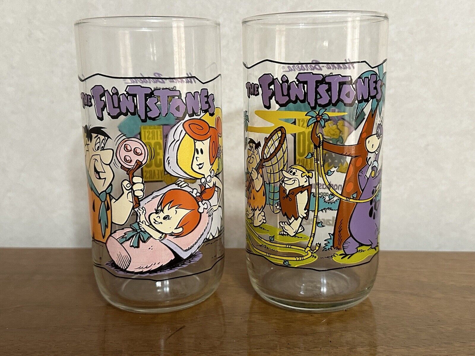 2 Different Hardee\'s Flintstones Promo Glasses \