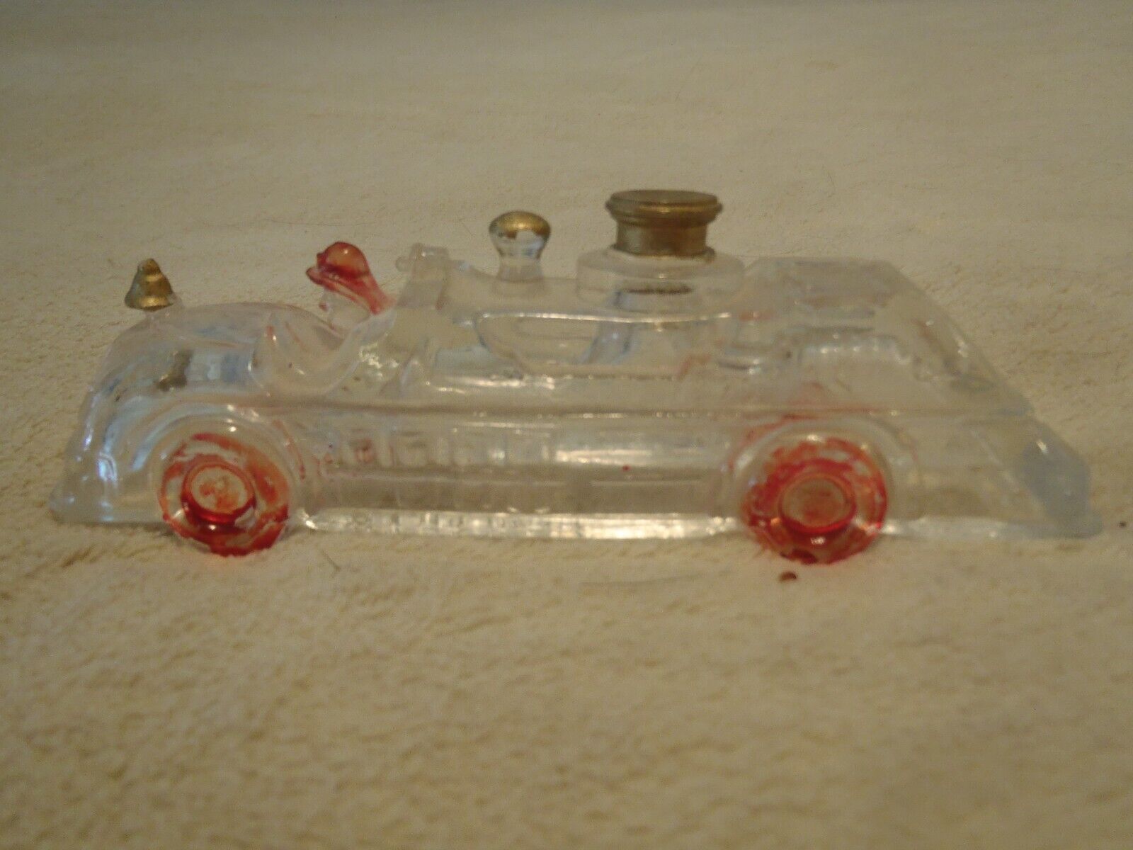 ANTIQUE GLASS CANDY CONTAINER - FIRE ENGINE W/FIREMAN - PAINTED