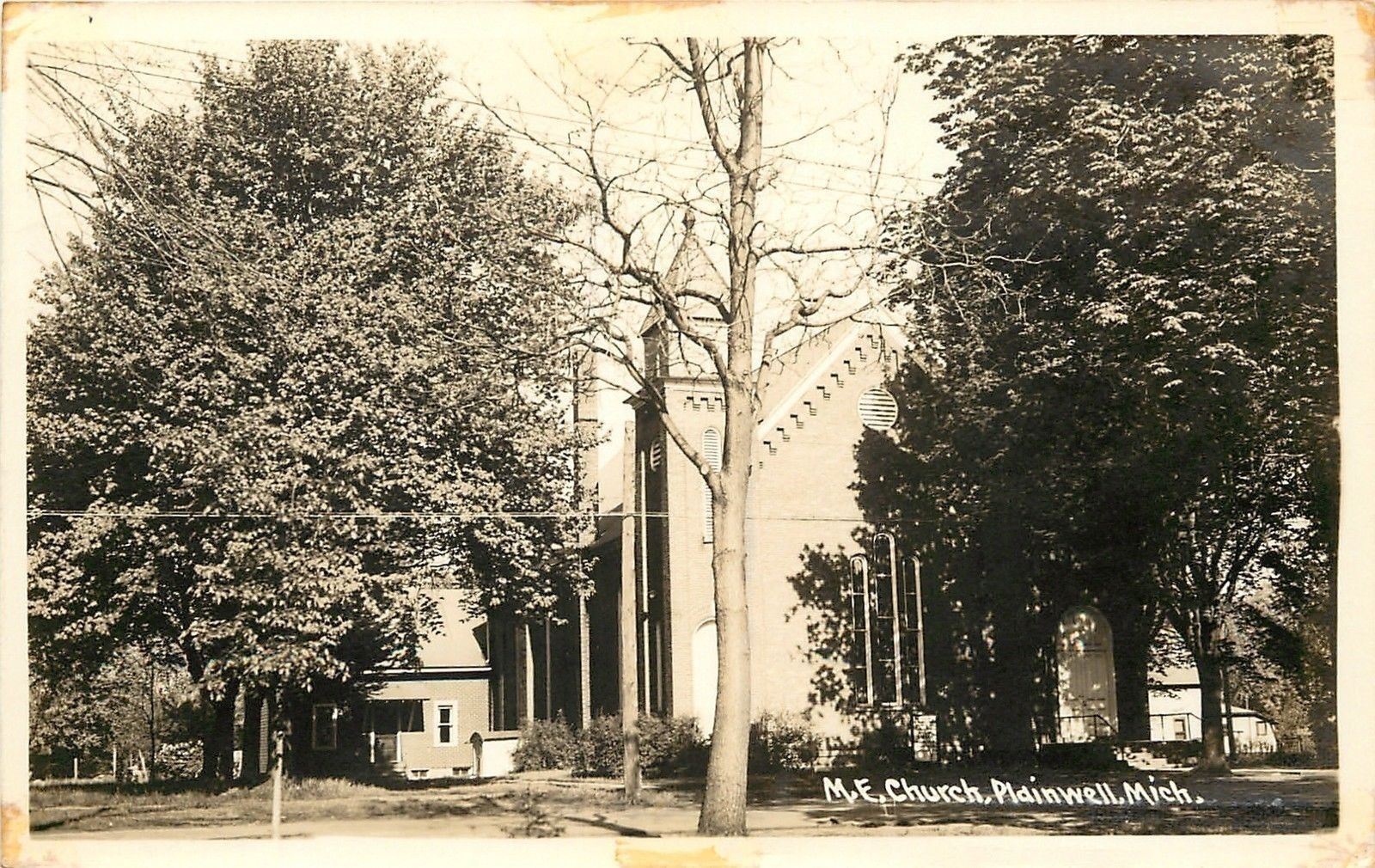 Plainwell MI United Methodist Episcopal~3 Trees, 1 Dead~Neighborhood RPPC 1940s