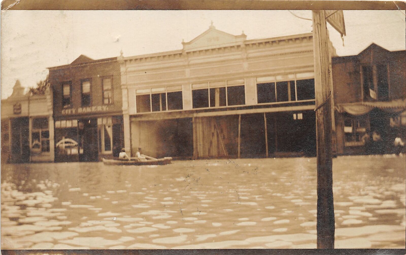 J5/ Marion Iowa RPPC Postcard c1909 Flood Disaster Stores City Bakery 56