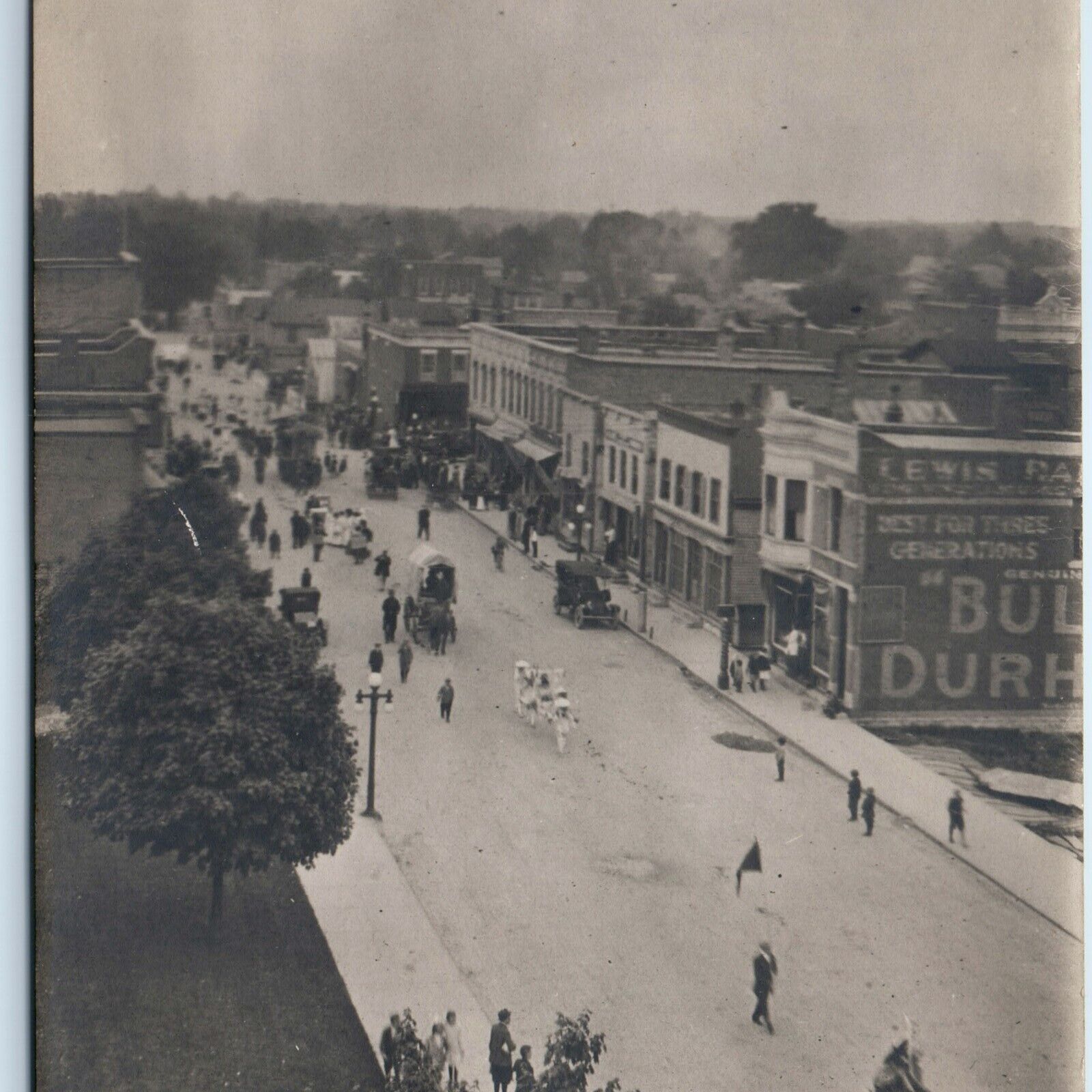 1900s Mystery Busy US Downtown RPPC Parade Bull Durham Tobacco Sign Main St A111