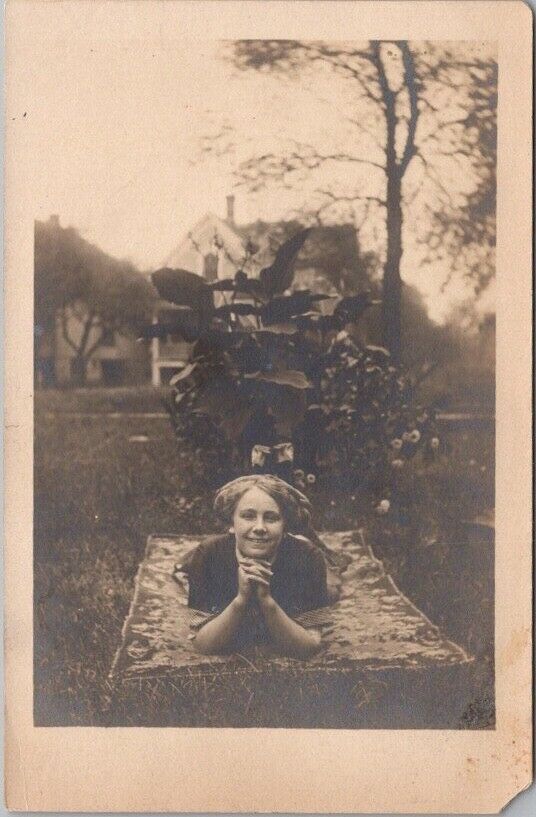 1910s RPPC Real Photo Postcard Pretty Girl in Cute Pose on Picnic Blanket / Yard