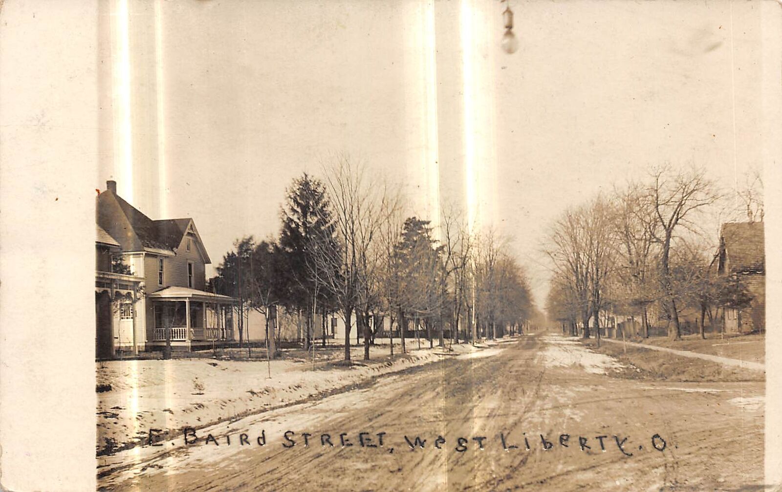 WEST LIBERTY Ohio postcard RPPC Logan County East Baird Street
