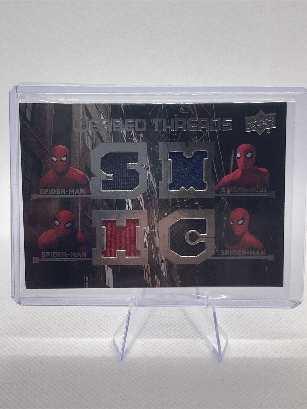 2017 Upper Deck Marvel Homecoming Webbed Threads Quad Memorabilia Spider-Man