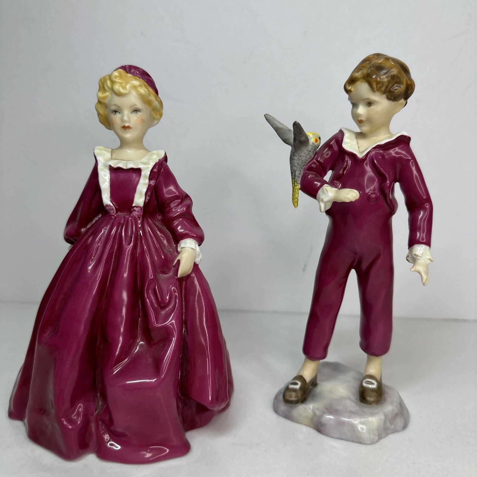 2 Royal Worcester figurines Lot Grandmothers Dress And The Parakeet Girl Boy