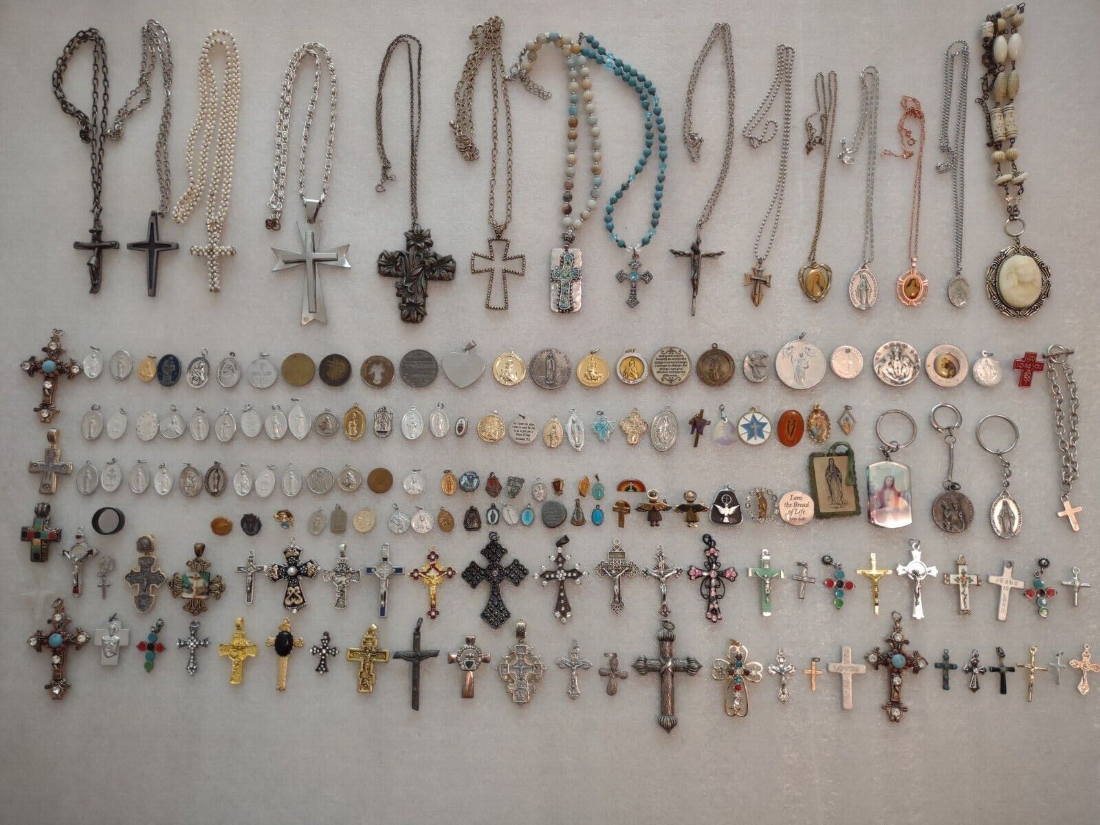 Huge Lot of Religious Jewelry Catholic Crosses Necklaces Pendants Medals Pins