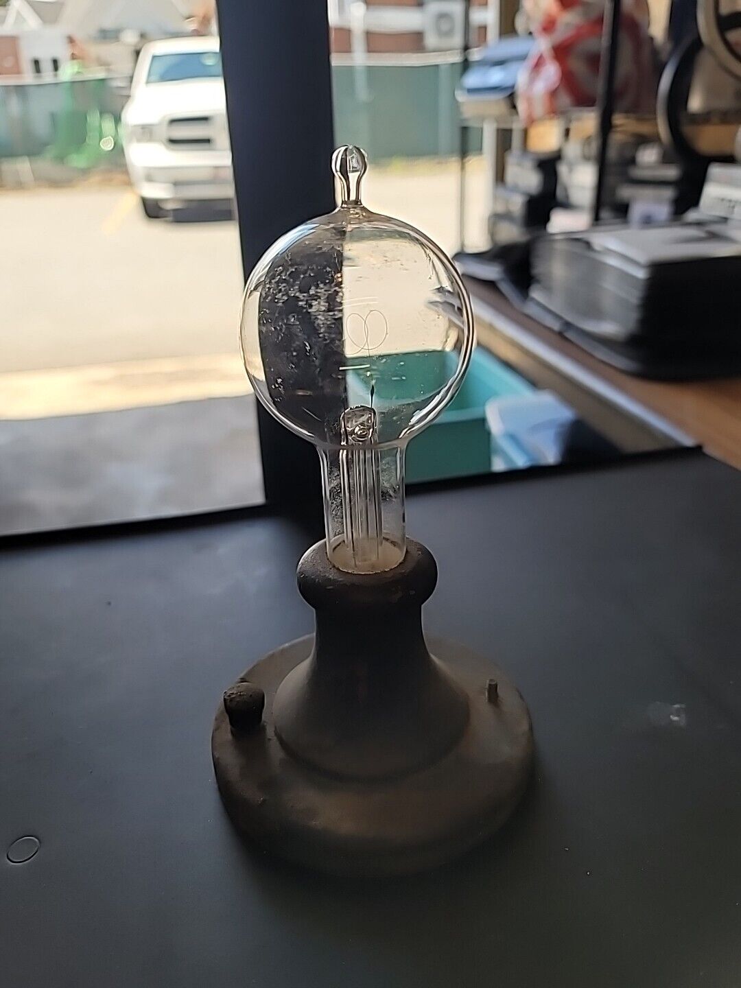 Antique Thomas Edison Light Bulb With Power Base