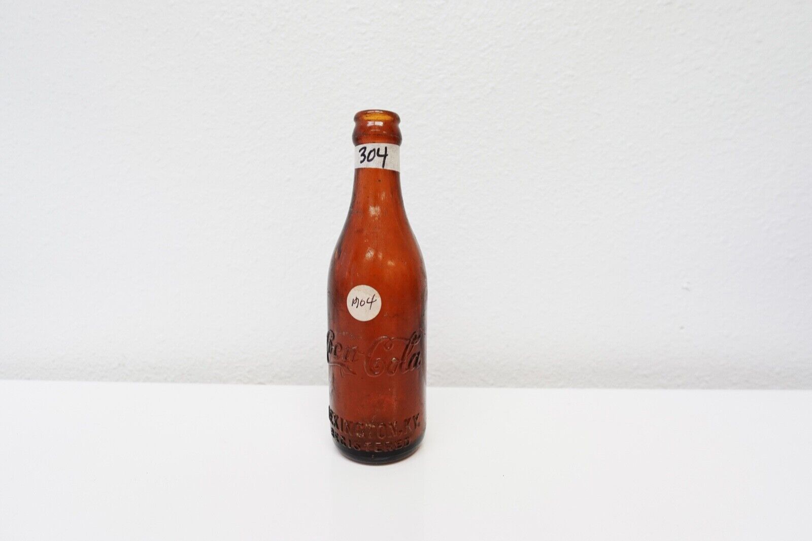 Antique Coca Cola Amber Lexington KY Kentucky Bottle from 1904
