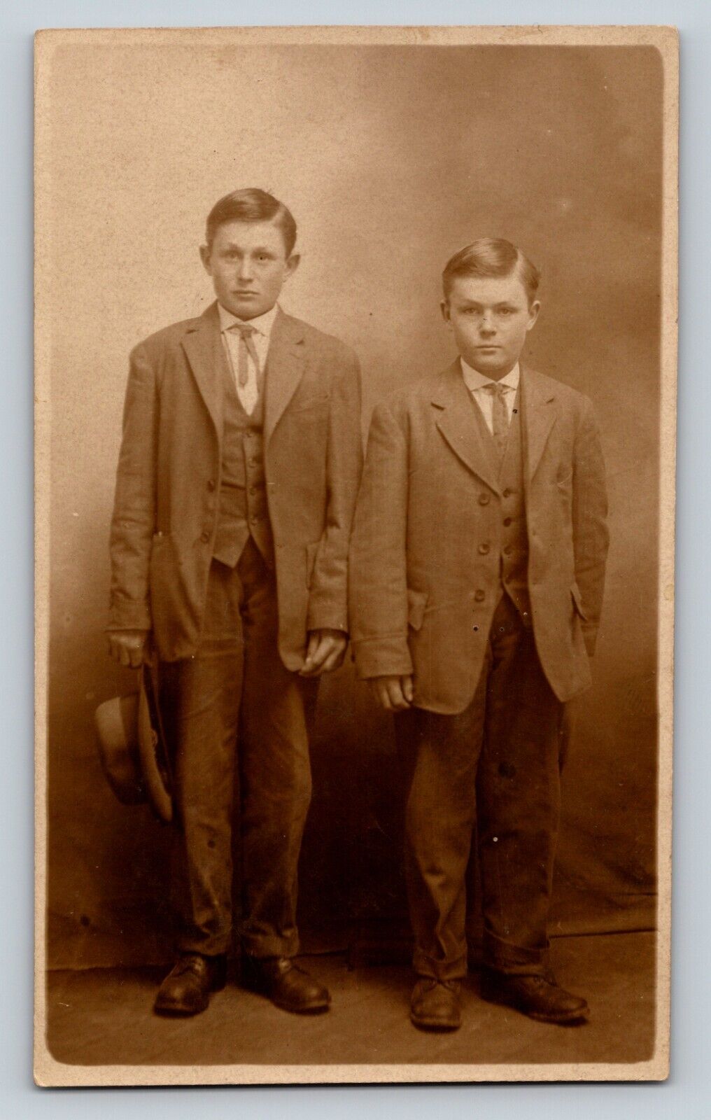 RPPC Postcard Two Boys Stand To Get Their Picture Taken AZO 1904-1919 (3x5\
