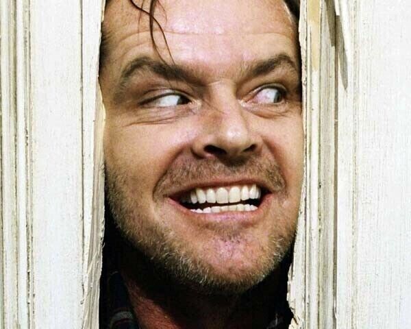 The Shining Jack Nicholson peers through door \