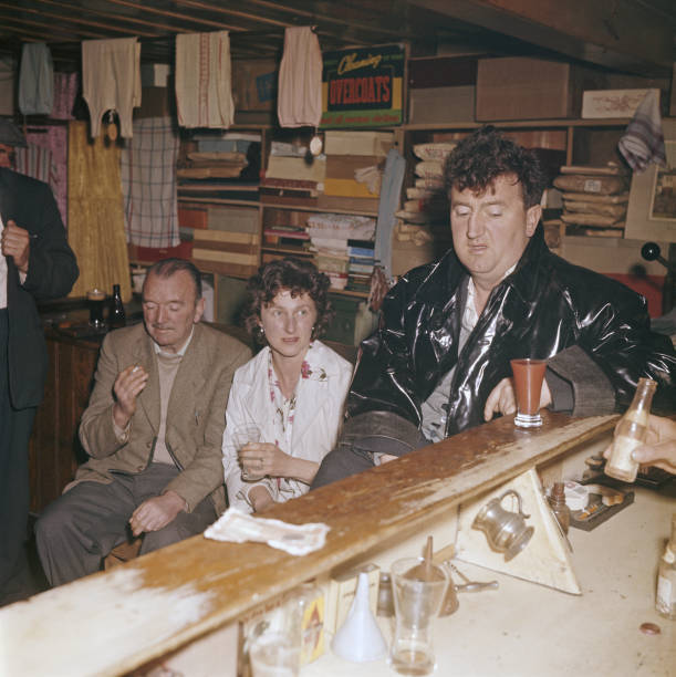 Irish poet and writer Brendan Behan pictured seated at a bar c- 1960s Old Photo