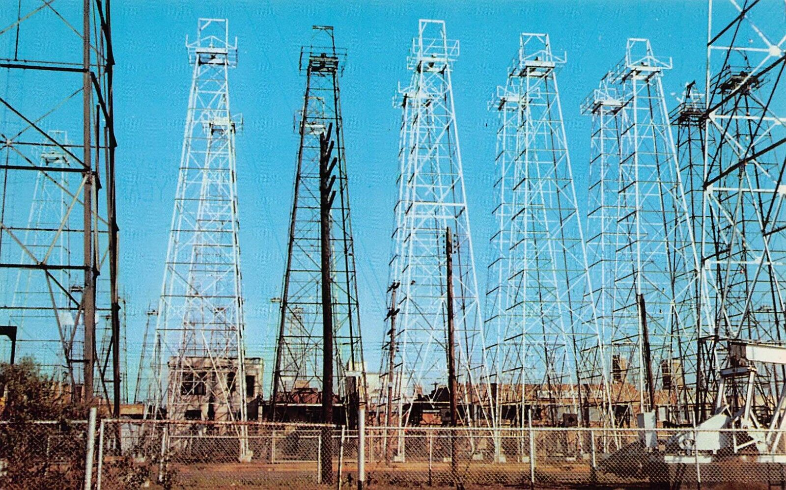 Kilgore TX East Texas Oil Field Wells Derricks Skyline Vtg Postcard C47