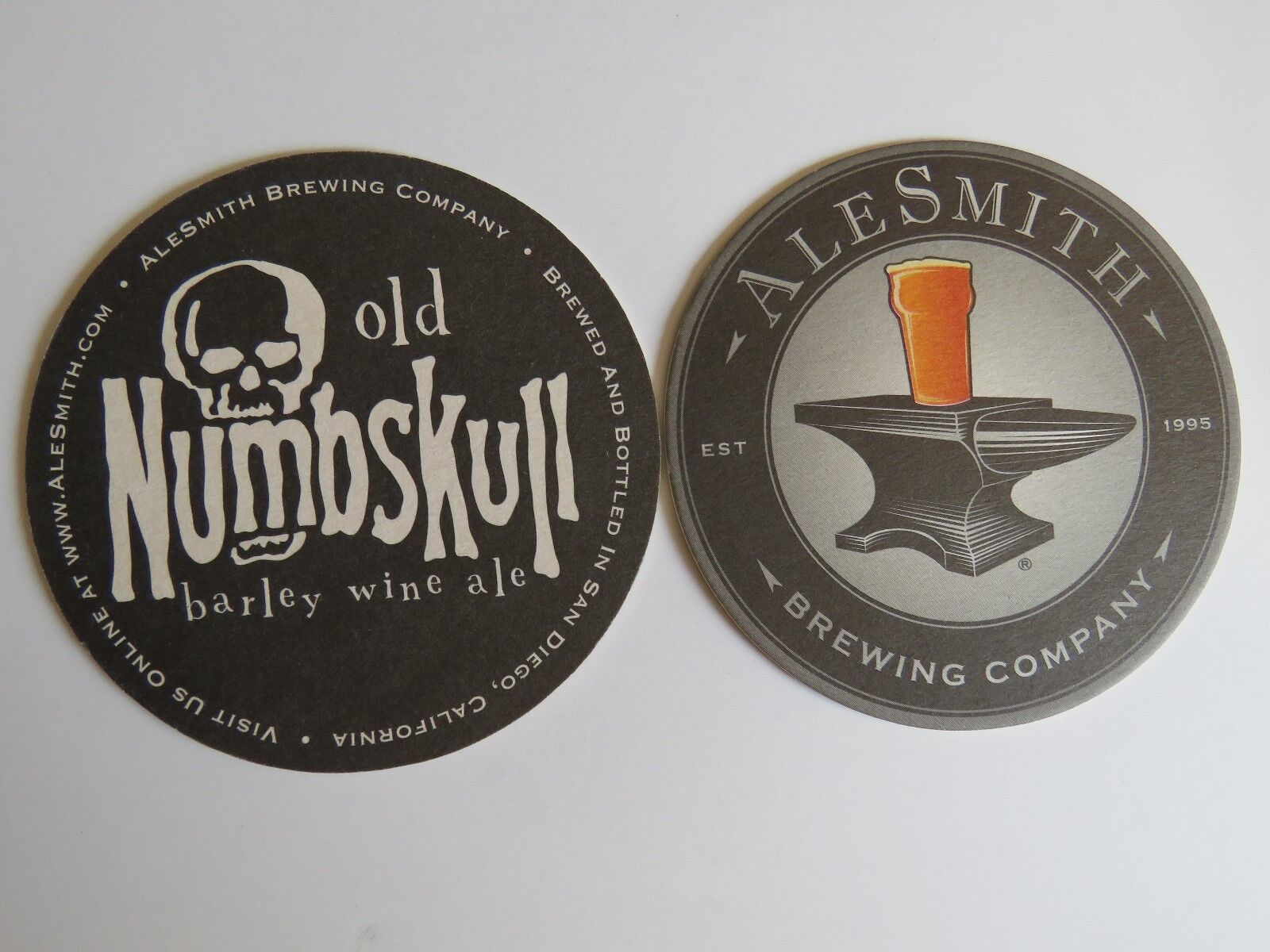 Beer COASTER ~ ALESMITH Brewing Co Old Numbskull Barley Wine Ale ~ CALIFORNIA