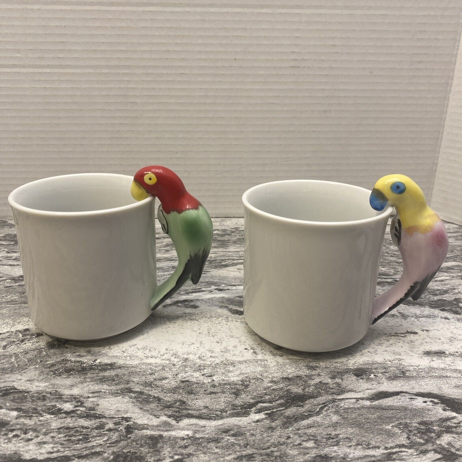 Pair Of Vintage Pier Parrot Coffee Mugs