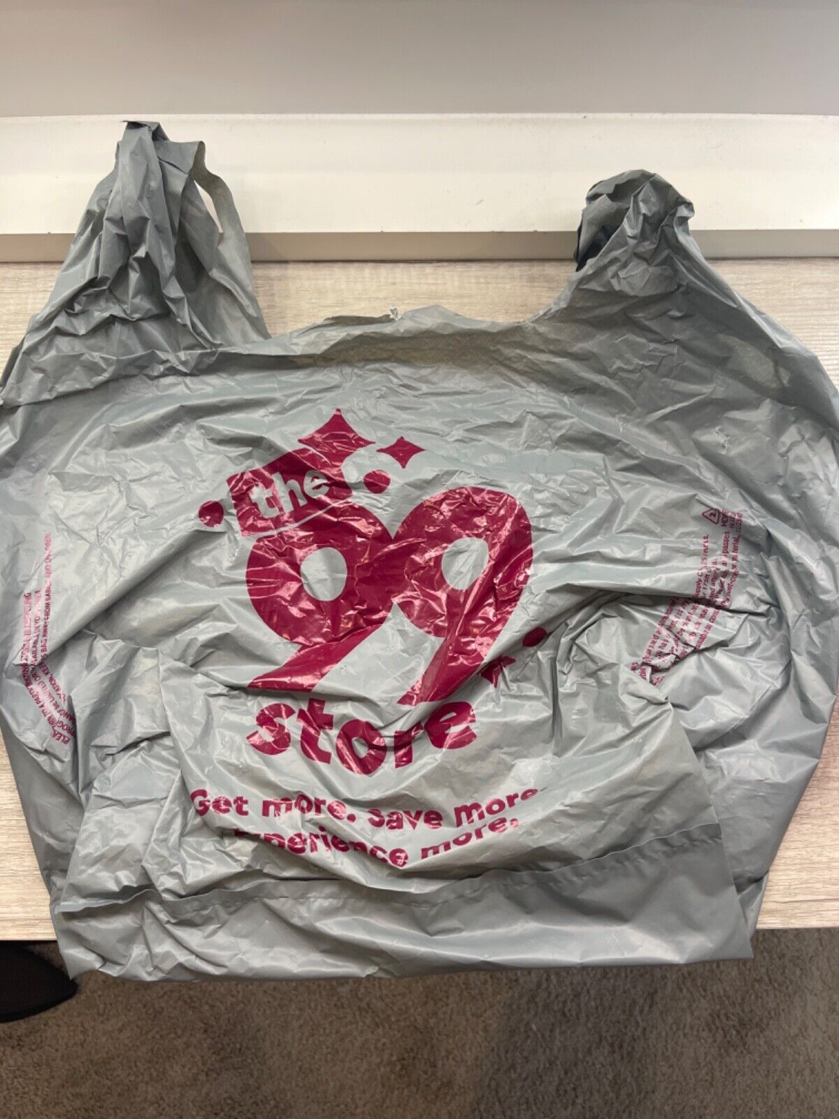 99 cent store bag \\ store closed: grey plastic bag. only used once
