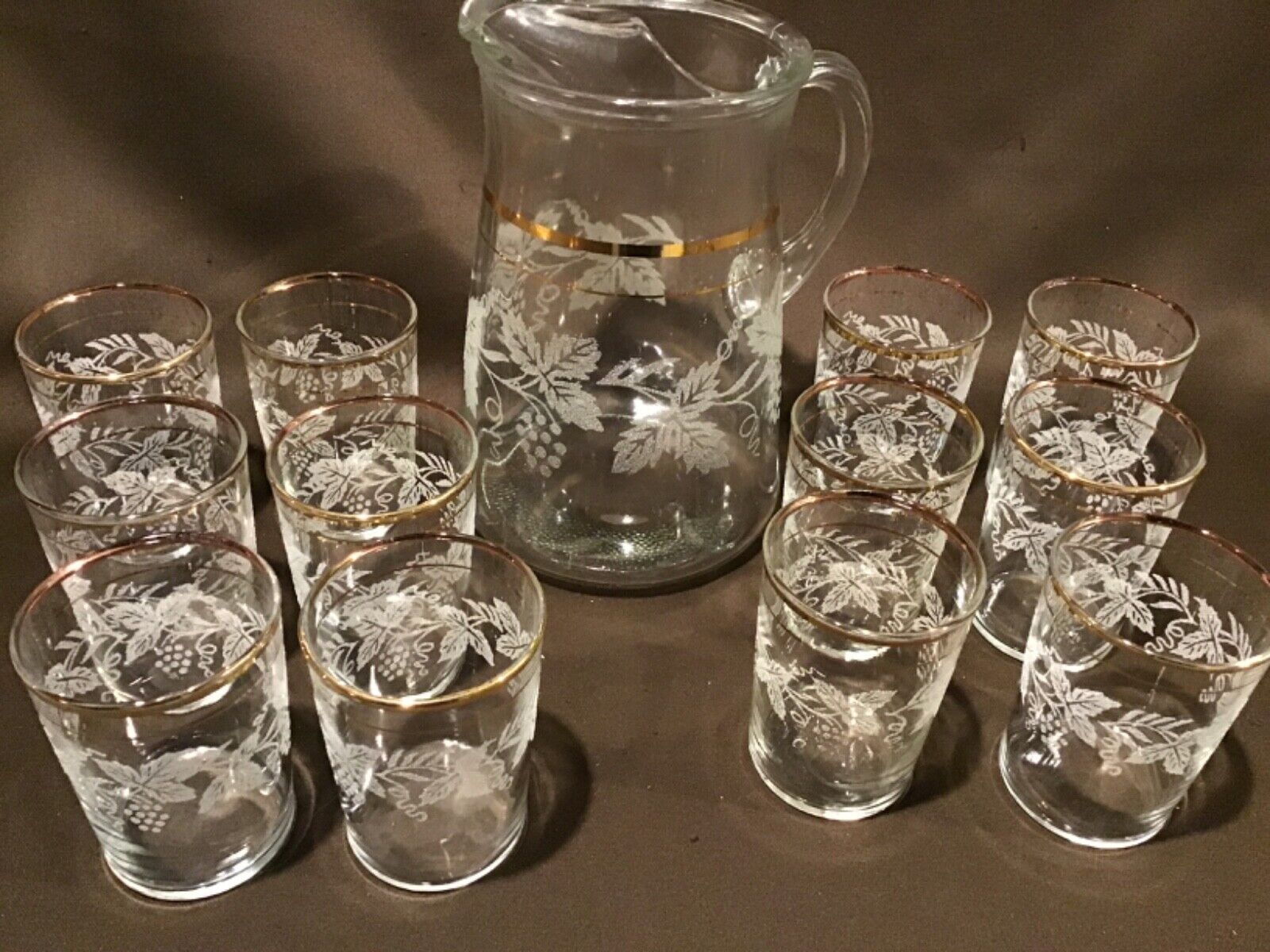 Vintage Clear Glass Pitcher With 12 Glasses Embossed Grape Vine Design Gold Band