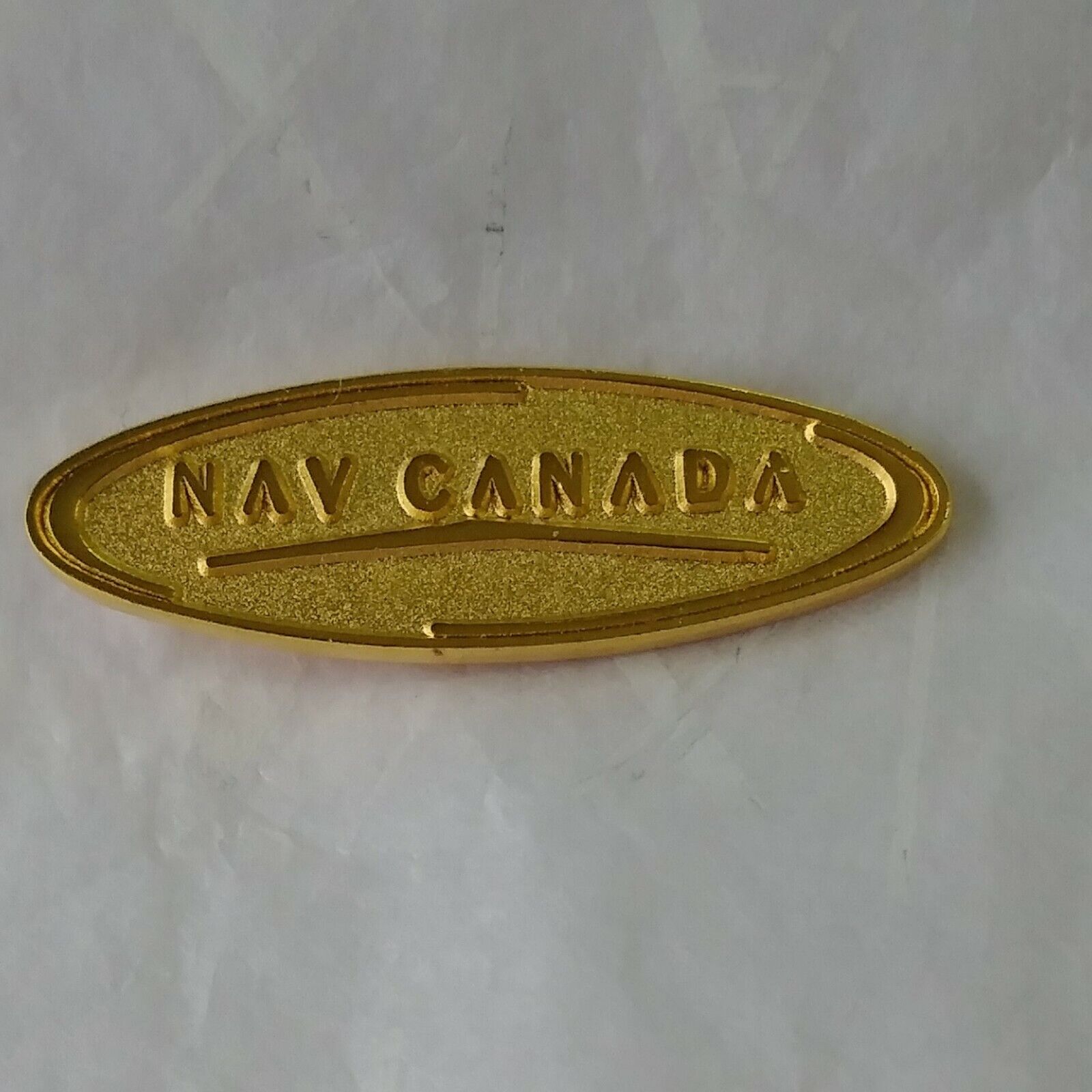 NAV CANADA Lapel Pin Canadian Civil Air Navigation Management Gold Color Oval