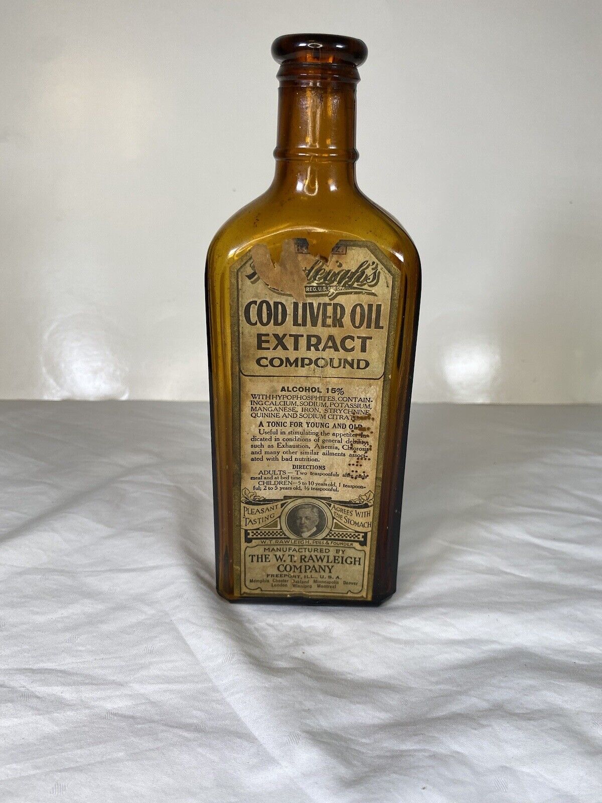 Antique Amber Bottle Circa 1915 W.T. Rawleigh's Cod Liver Oil Extract Compound.