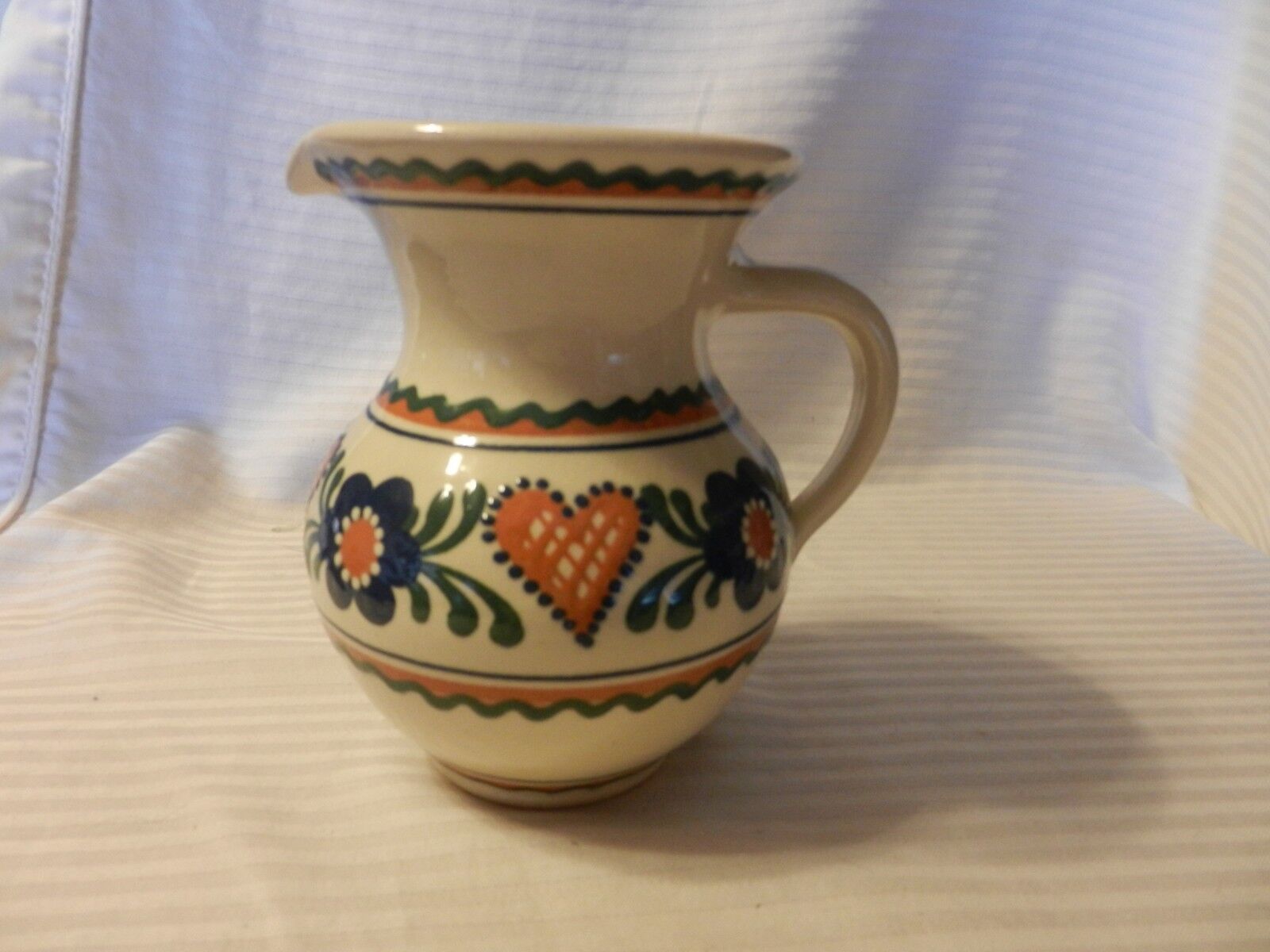 Small White Ceramic Pitcher Floral Embossed Design Blue, Green, Tan 5.75\