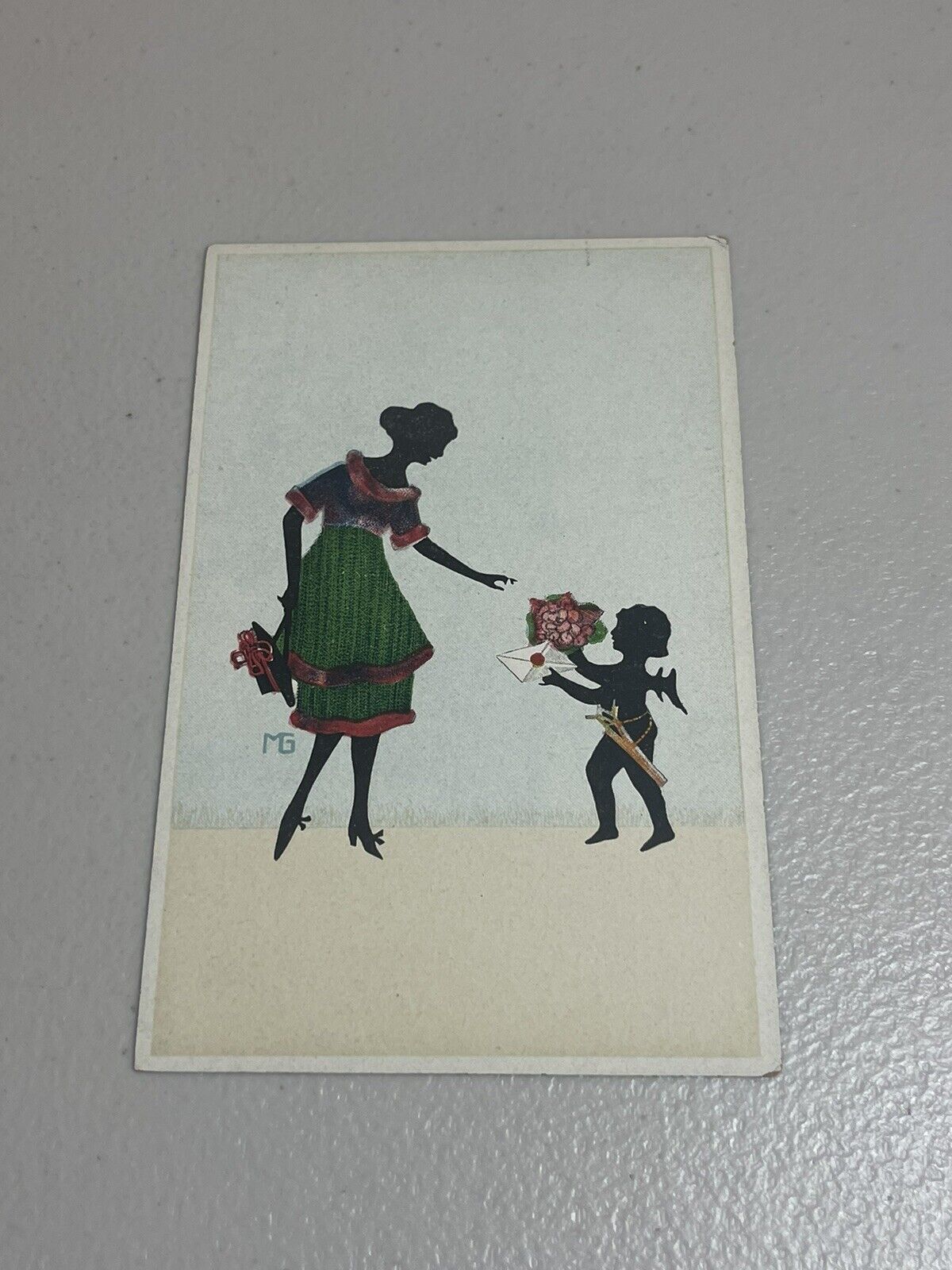 Artist Signed MG Marte Graf Lady With Cupid Silhouette  postcard