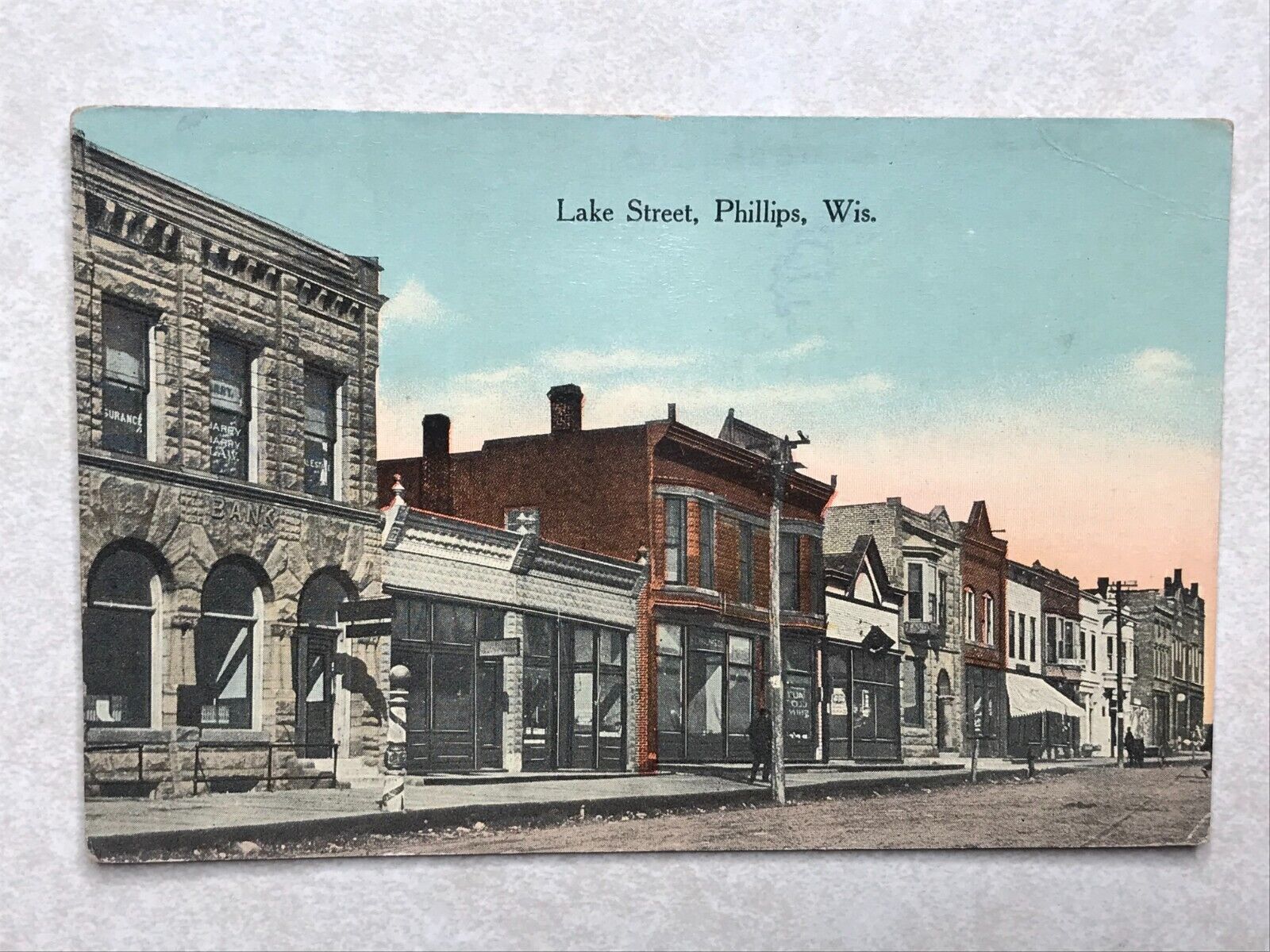 F1035 Postcard Lake Street Phillips WI Wisconsin