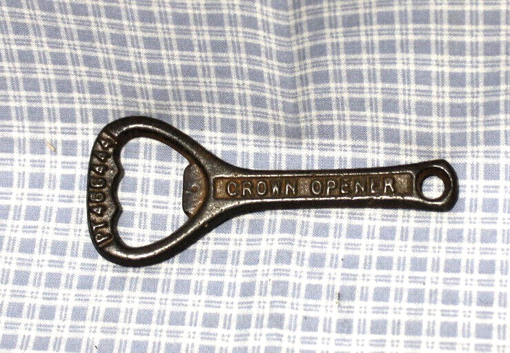 VINTAGE CAST IRON CROWN BOTTLE OPENER - MADE IN ENGLAND FROM 1936