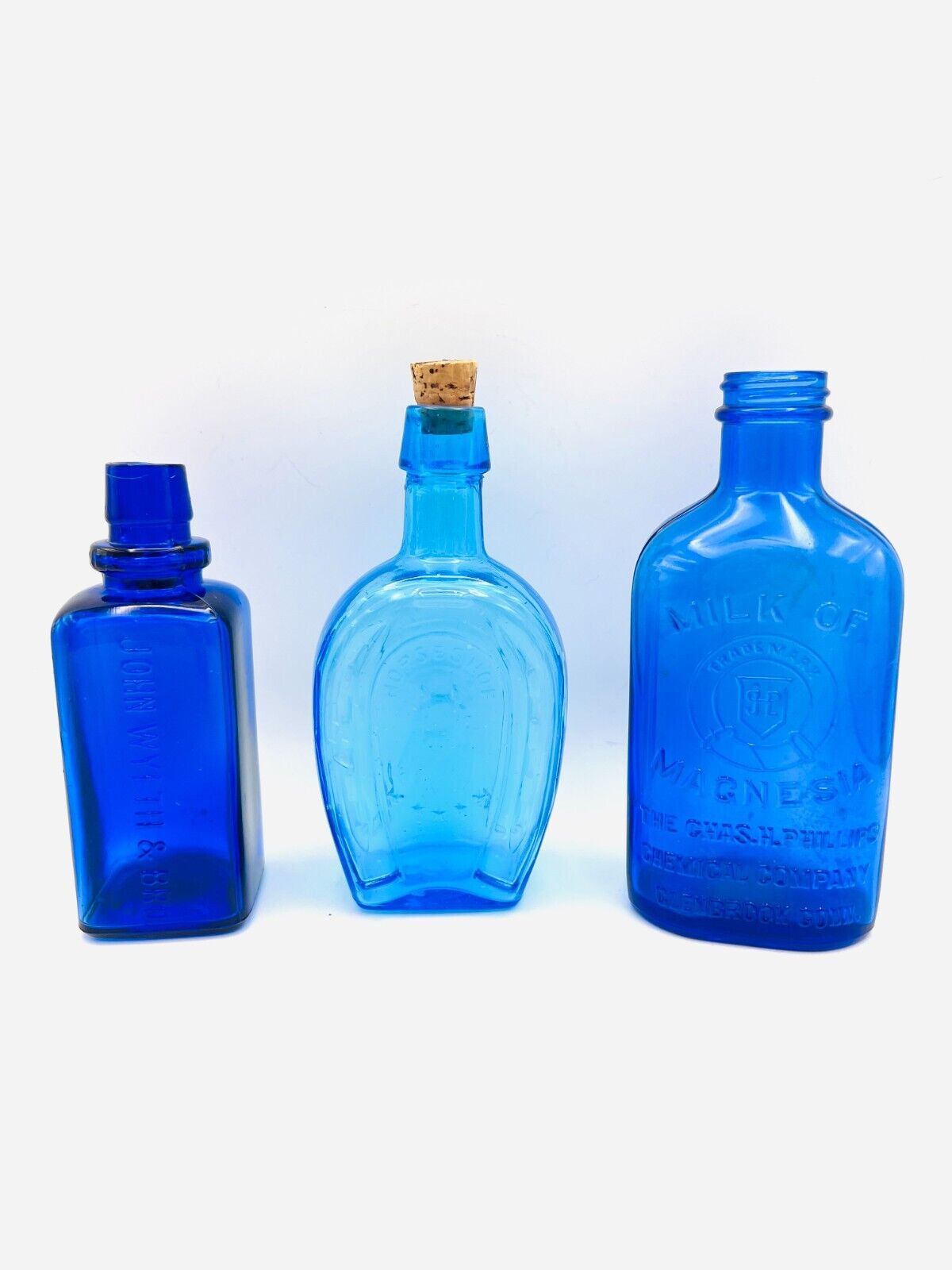 3 old/antique blue bottles: John Wyeth, Horseshoe, Milk of Magnesia