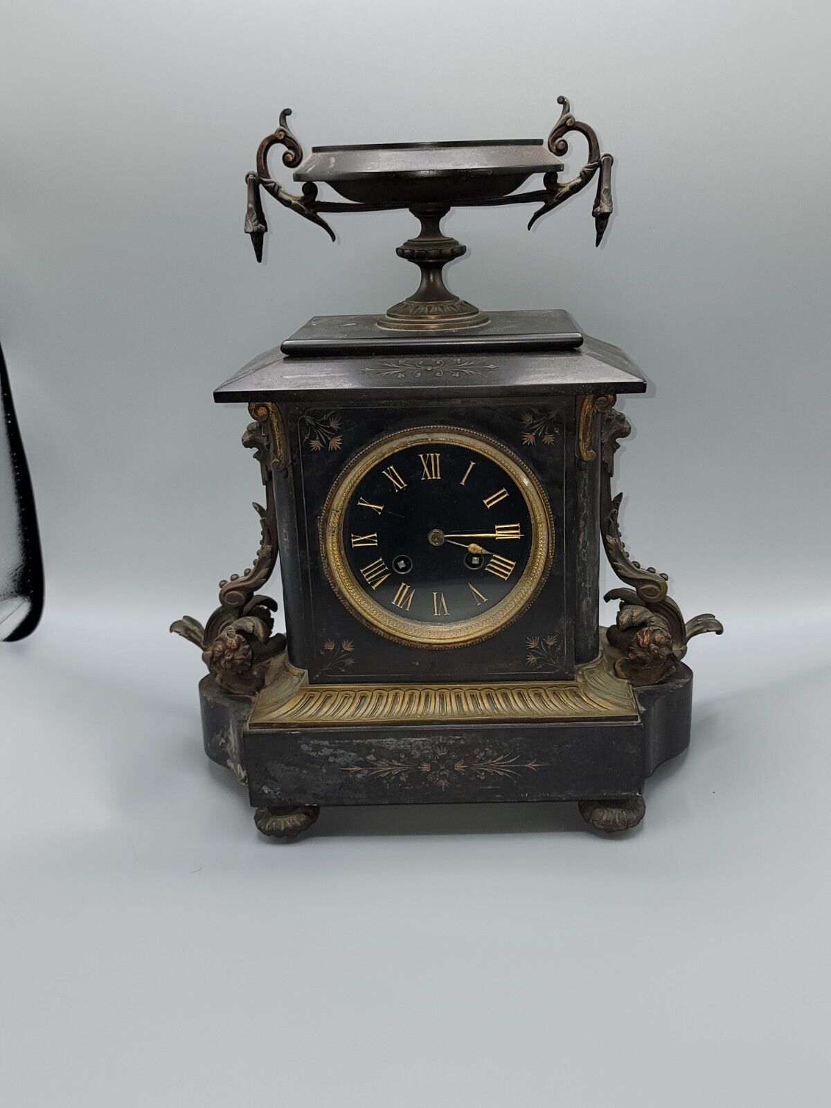 Antique French Black Slate and Iron Mantle  clock.  Working