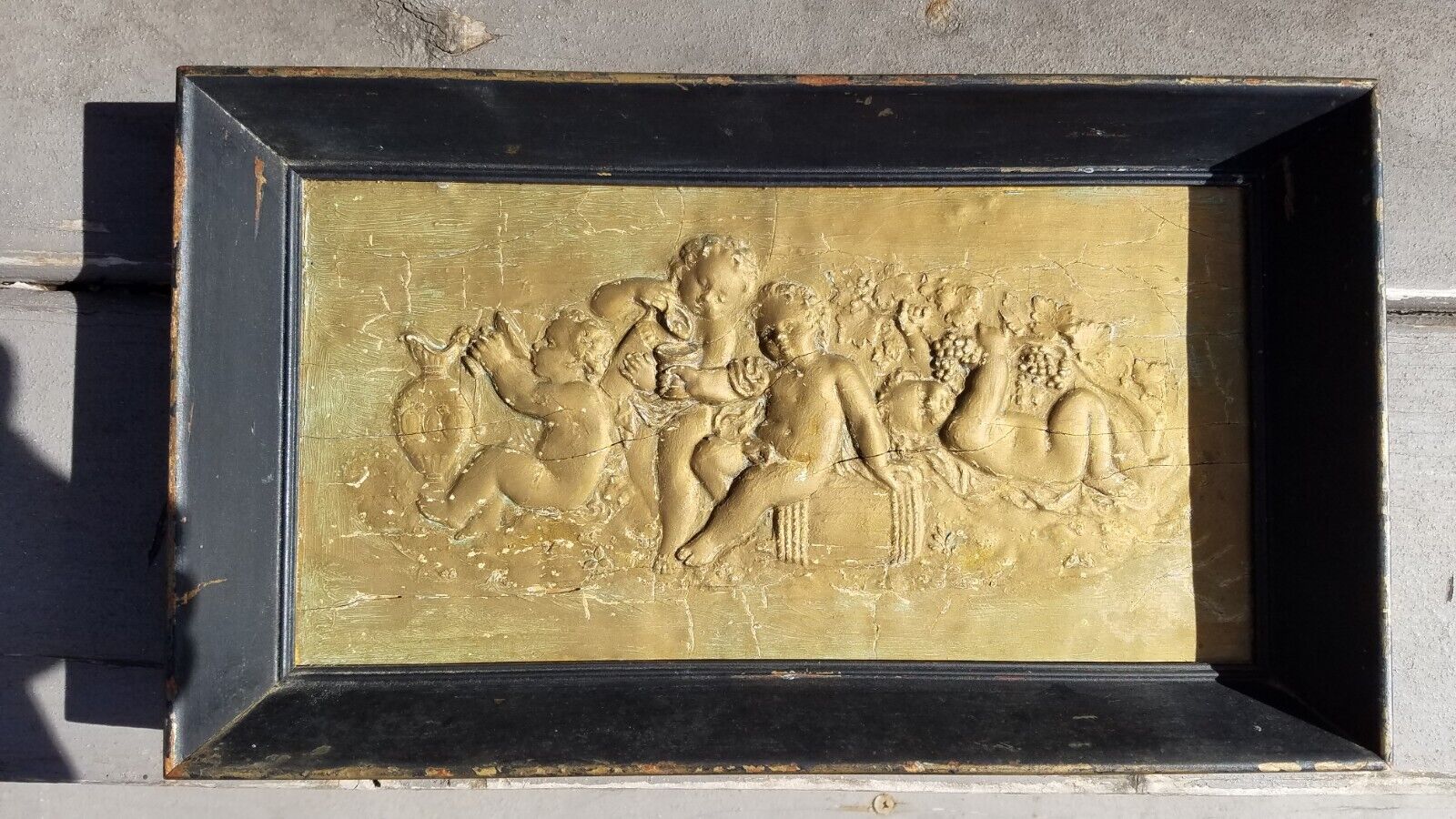 Antique wooden relief picture cherubs painted or gilded gold