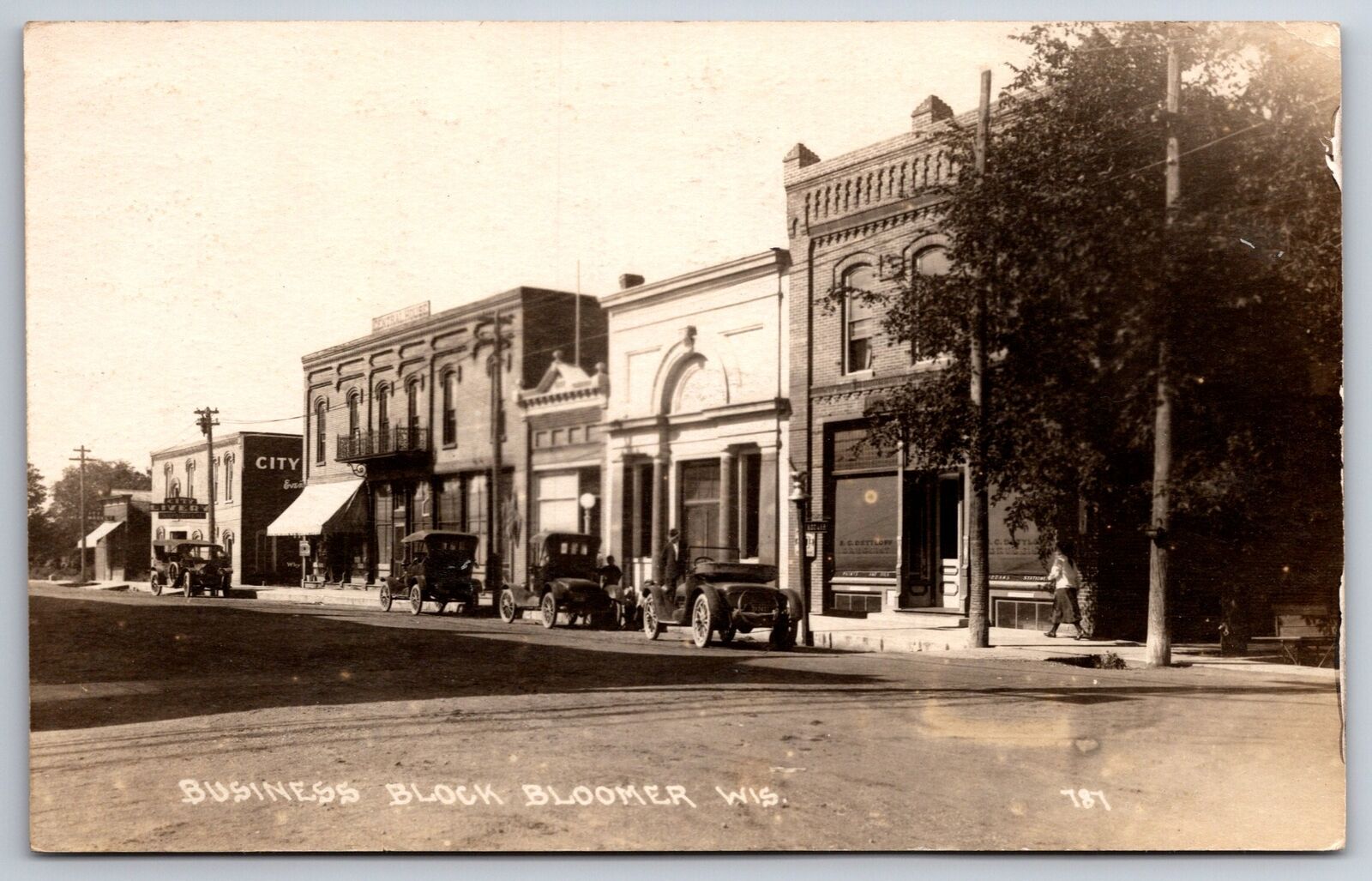 Bloomer Wisconsin~Business Block~Drug Store~City Livery~Vintage Autos~c1910 RPPC