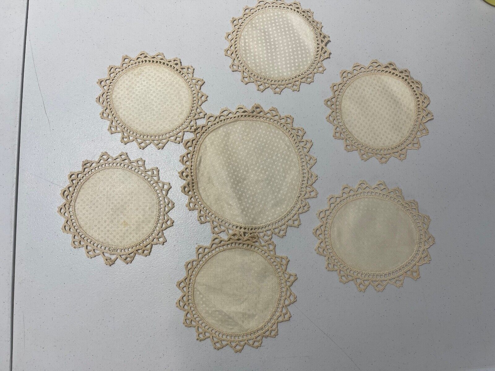 Vintage Set of 7 Embroidered Coasters Round cream color