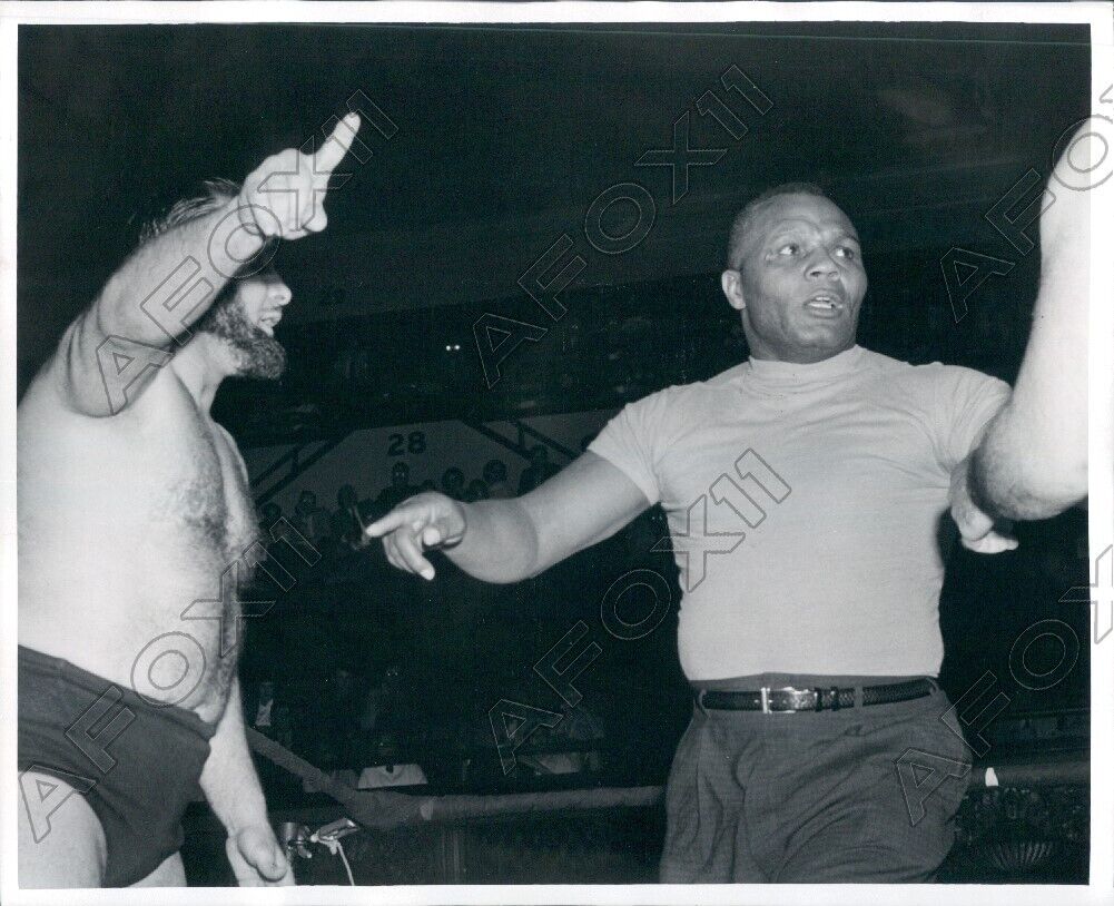 1957 Wrestler Ivan Kalmikoff Arguing with Boxer Joe Walcott Press Photo