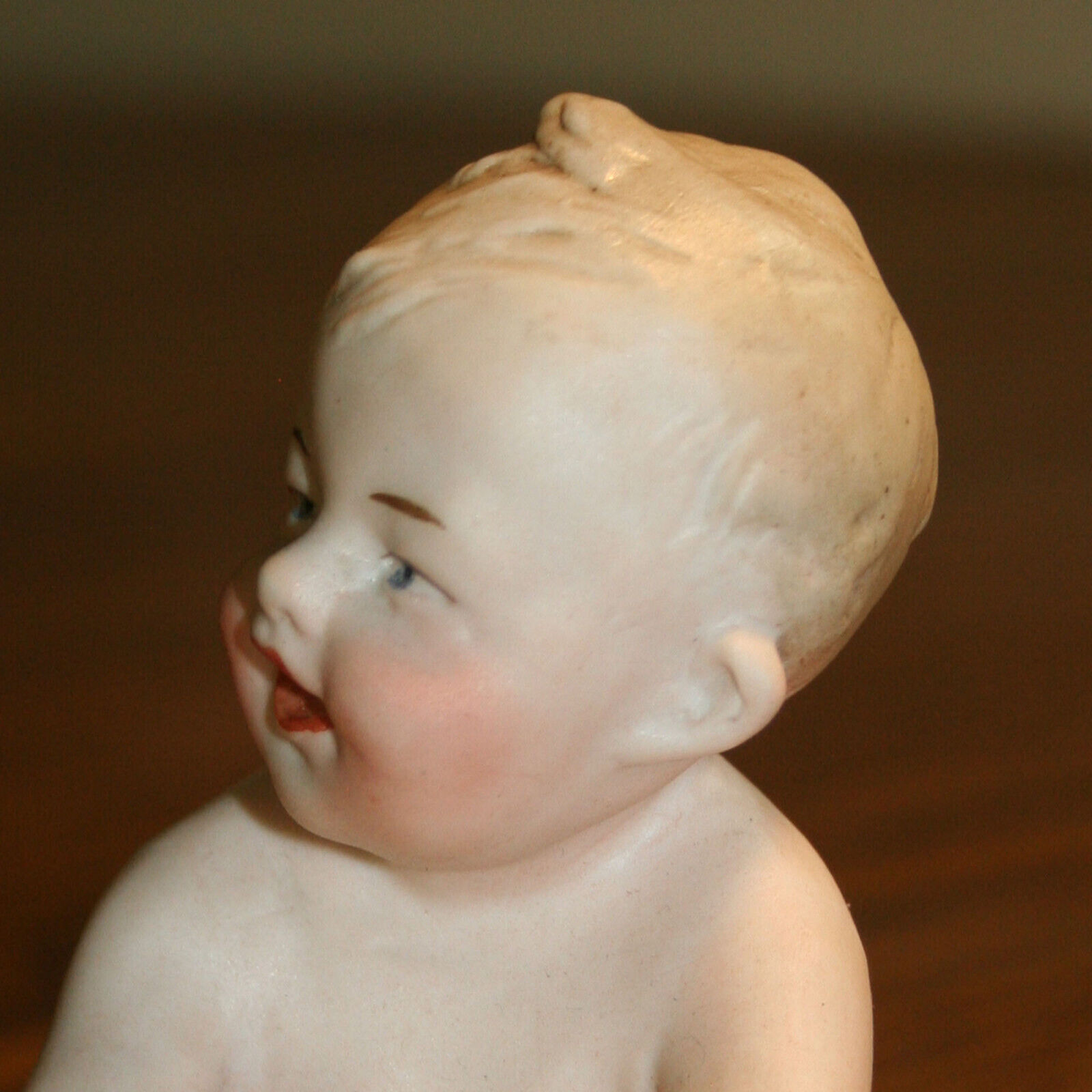 Antique Gebrüder Heubach porcelain bisque seated laughing action baby