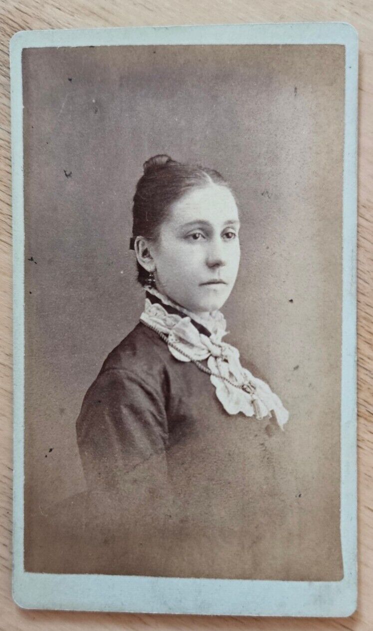 St. Louis, MO CDV pensive woman with white bow collar, chain by J.W. Fischer